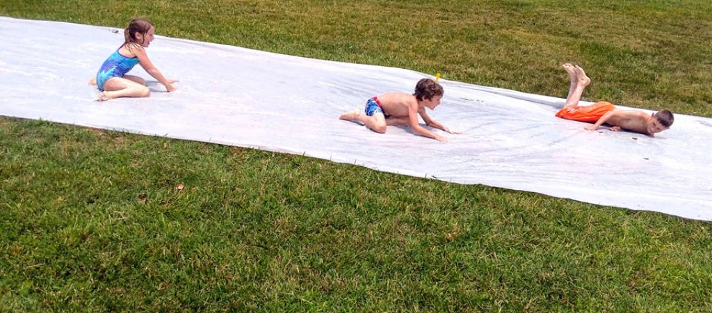 A super sized water slide is great for cooling of at camp
